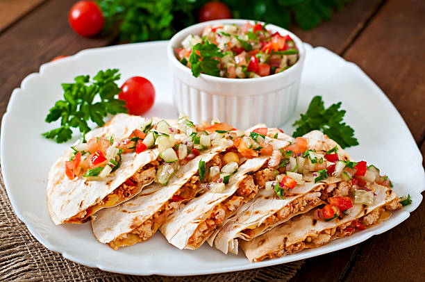 istock Mexican Quesadilla wrap with chicken, corn and salsa 475563306