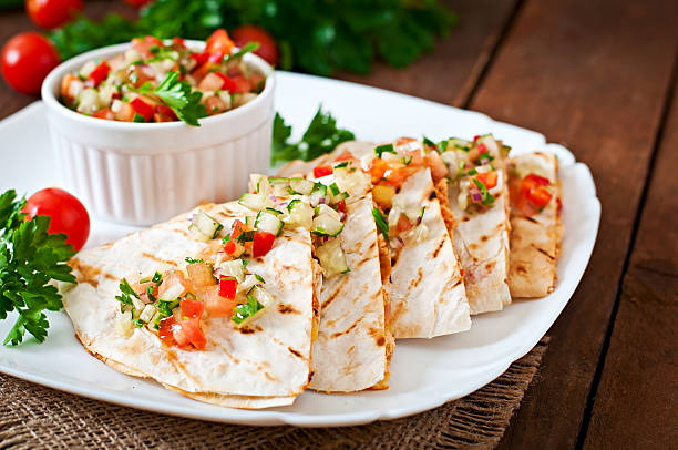 istock Mexican Quesadilla wrap with chicken, corn and salsa 475563308