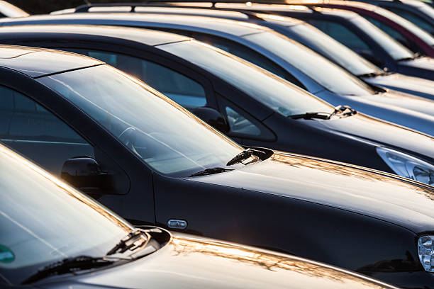 istock cars in a row in backlit 475564131