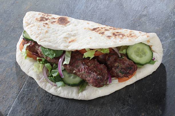 istock chicken lamb kofte shish kofta kebab naan sandwich 475564569