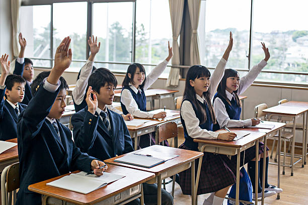 istock Japanese raising their hands up about the question 475565648