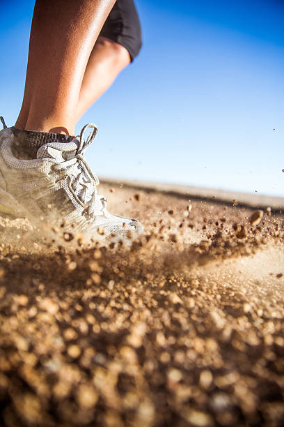 istock Running on gravel road 475565910