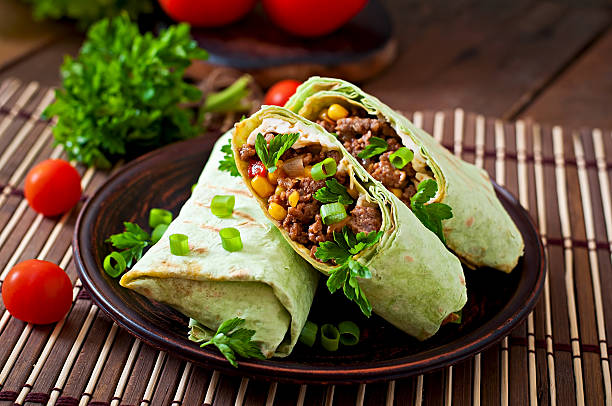 istock Burritos wraps with minced beef and vegetables 475566284