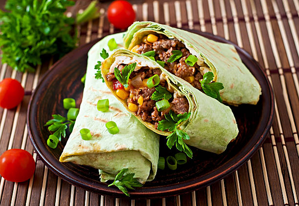istock Burritos wraps with minced beef and vegetables 475566732
