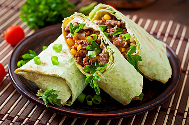istock Burritos wraps with minced beef and vegetables 475566734