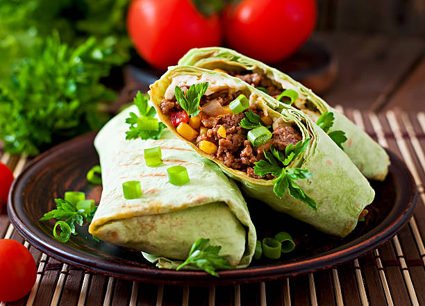 istock Burritos wraps with minced beef and vegetables 475566736