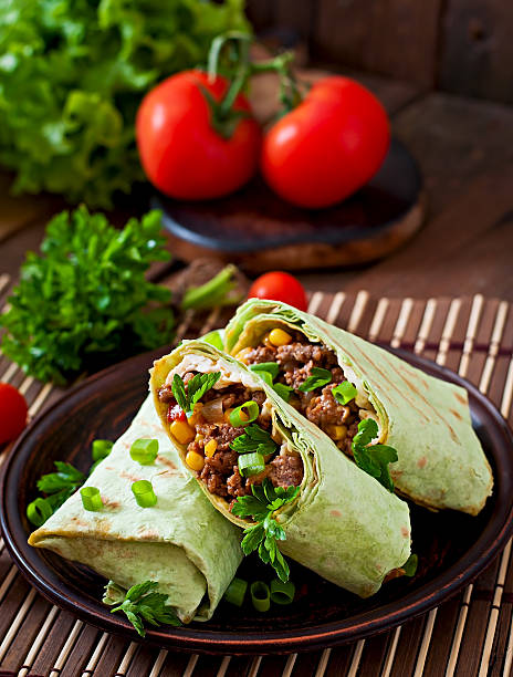 istock Burritos wraps with minced beef and vegetables 475566738