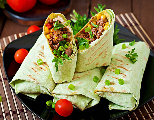 istock Burritos wraps with minced beef and vegetables 475566742