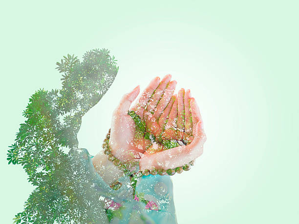 istock muslim woman praying for Allah 475566872