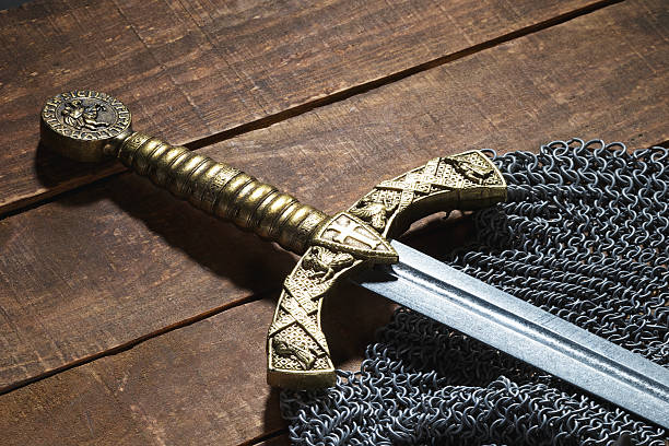 istock sword and the soldier's helmet 475569660