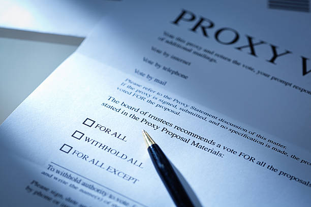 financial proxy głosowanie głosowanie dokument formularza biznes pismo - application form contract signing form zdjęcia i obrazy z banku zdjęć