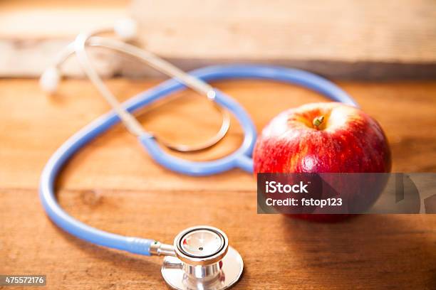 Apple A Day Keeps The Doctor Away Stethoscope Stock Photo - Download Image Now - 2015, An Apple A Day Keeps The Doctor Away, Apple - Fruit