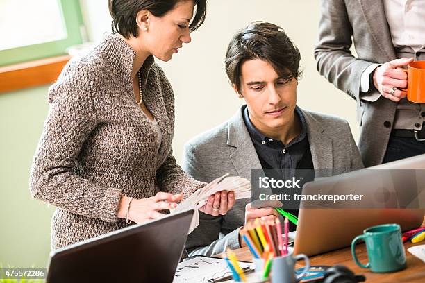 Team Coworking In The Office Stock Photo - Download Image Now - 2015, 30-39 Years, 40-49 Years