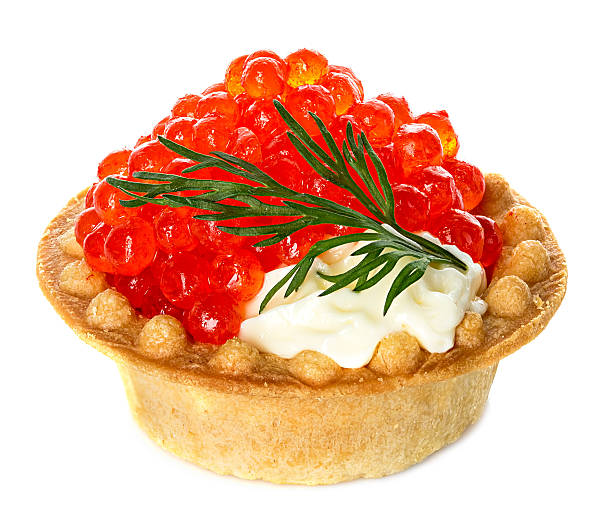 istock Tartlet with red caviar isolated on white background 475579484