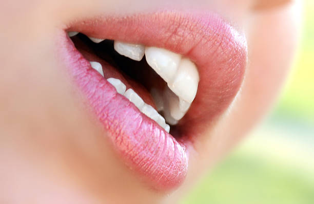 istock beautiful woman lips 475582968