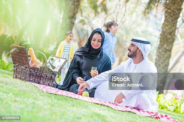 Picnicing In A Park Stock Photo - Download Image Now - 2015, Abaya - Clothing, Adult