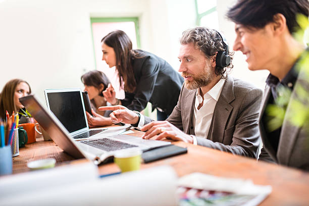 istock team coworking in the office 475593026