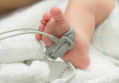Pulse oximeter sensor on a baby foot