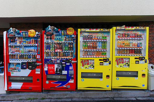 Tokyo, Japan - May 13, 2015:  Typical set of Vending machines in the streets of Tokyo. Japan is famous for its vending machines, with more than 5.5 million machines nationwide.