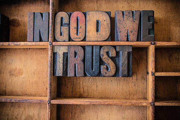 istock In God We Trust Concept Wooden Letterpress Theme 475602540