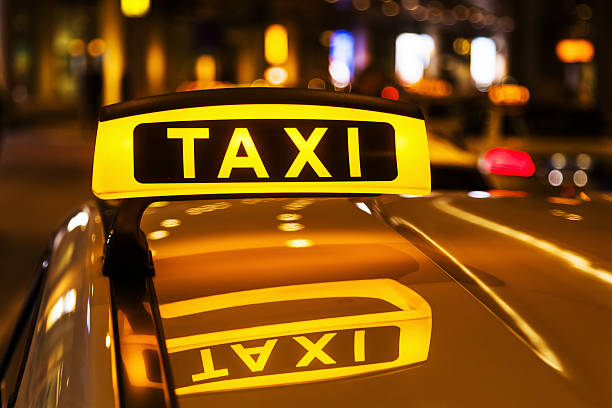 istock reflecting taxi sign 475603855