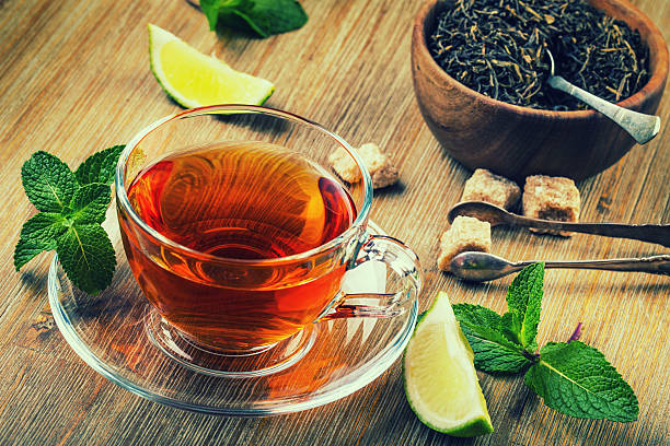 Tea in a glass cup, mint leaves