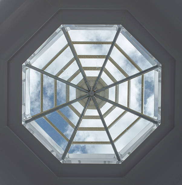 istock Mirror roof of building with cloud and sky 475606062