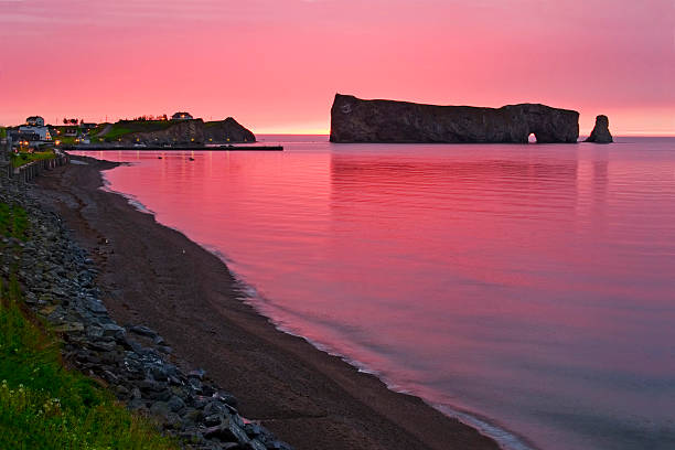Early sunrise at Perce Rock in Gaspe An Early sunrise at Perce Rock in Gaspe gaspe peninsula stock pictures, royalty-free photos & images