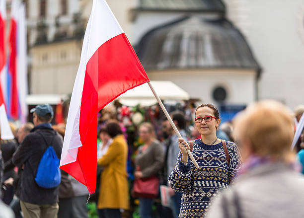 istock Young woman with the Polish flag 475610004