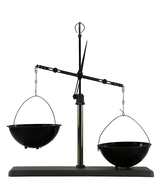 istock Imbalanced scales isolated on the white background 475610482