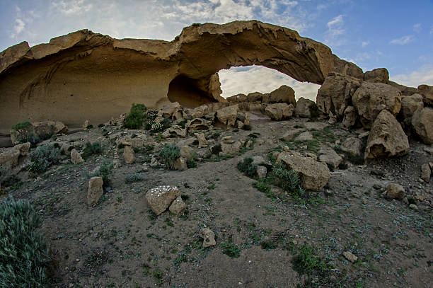 In the unpopulated Fountain County sets sandstone cliffs of and an arch craved in the steep rock face.  The bear creek forming the ravines and rocky cliffs flows into the Wabash River.  This is a National Natural Landmark.  The steps to the creek is steep and can be slippery.  You will probably be alone.