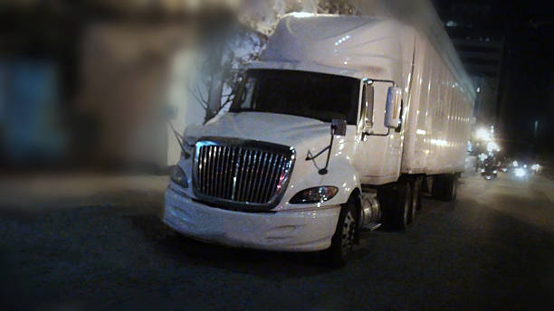 istock Truck On The Road In The Evening 475613564