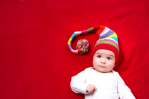 istock Baby in red and white hat 475614380