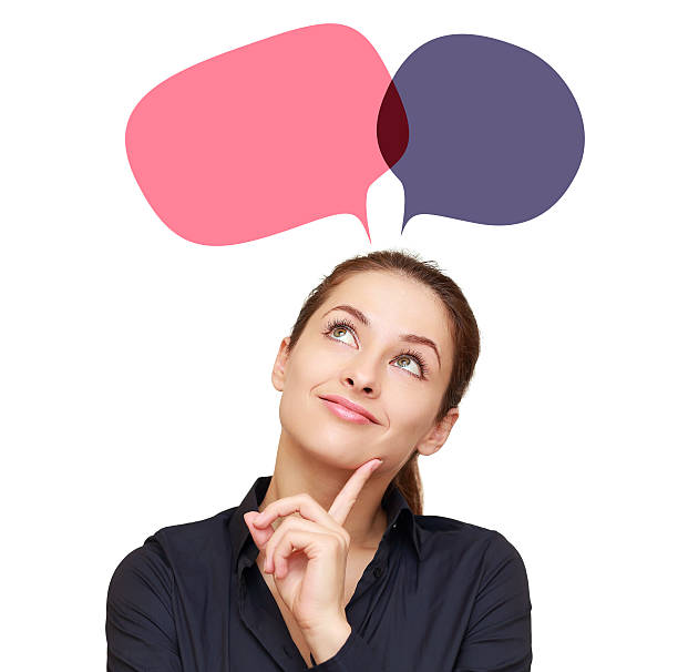 istock Smiling thinking woman with two web color bubbles above 475614413