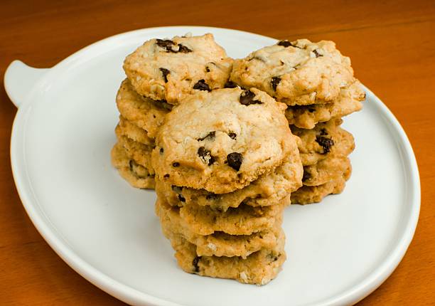 istock Chocolate chip cookies on wood table 475614718