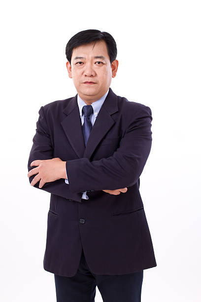 istock senior business executive crossing arms 475617810
