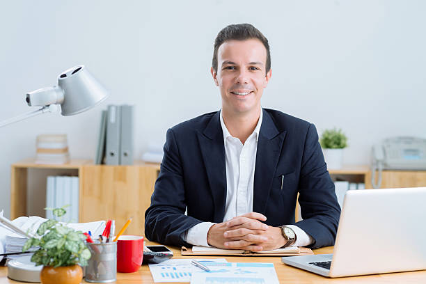 istock Smiling elegant businessman 475617992