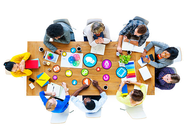 istock Multiethnic Group of People Meeting with Symbol 475629520