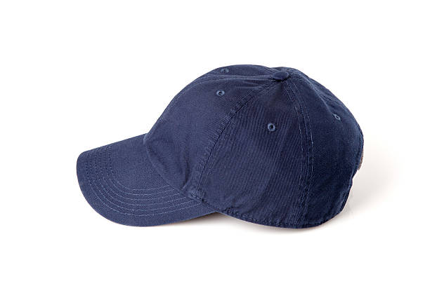 istock Dark blue cap on the head ready for branding. 475630084