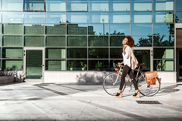 istock Beautiful woman office worker outside the office 475632484