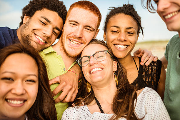 istock Group of friends laughing and doing a selfie 475632714