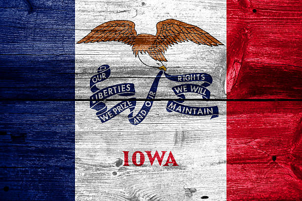 istock Iowa State Flag painted on old wood plank texture 475633659