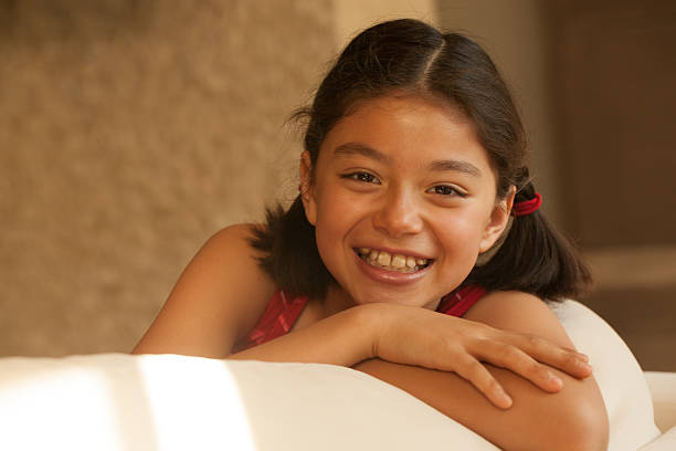 istock Smiling young Eurasian girl 475635202