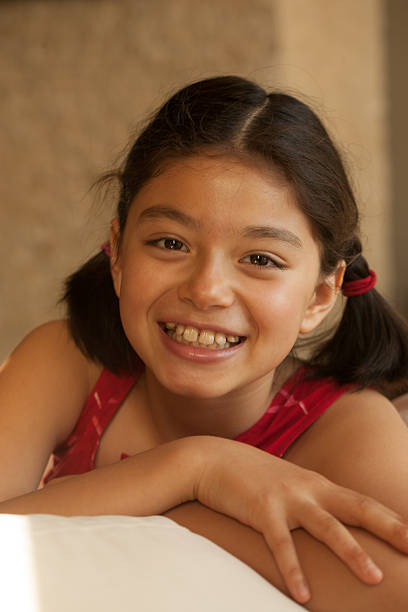 istock Smiling young Eurasian girl 475635204