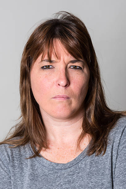 istock Serious mature woman 475636632