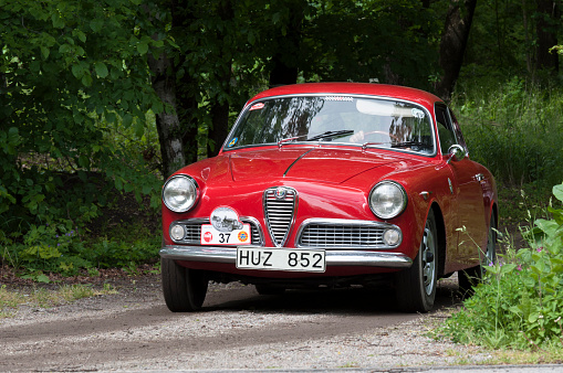 Stockholm, Sweden - June 03,2012: A fully restored Alfa Romeo Guiletta from 1962, in a classic car cavalcade around the small island Djurgarden on the public road in Stockholm Sweden.