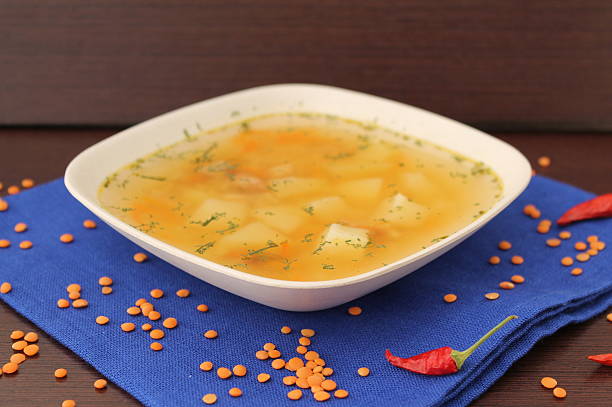 istock light soup with red lentils,carrots and potatoes 475639692