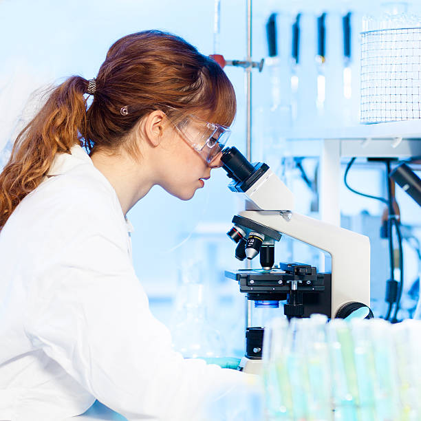 istock Health care professional in lab. 475641411