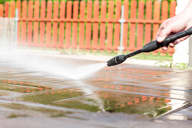 istock Cleaning floor with high pressure cleaner 475643458
