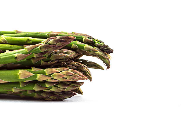 Bunch of asparagus on white background